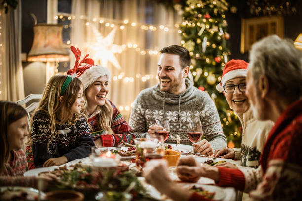 istock Family's New Year's Eve at dining table! 1178294104