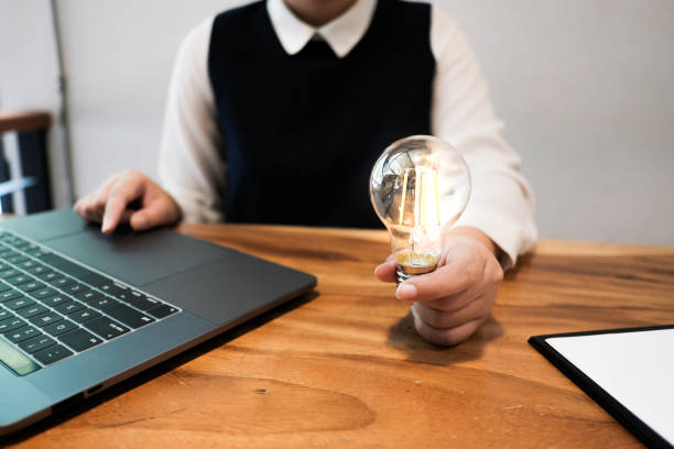 istock Creative idea Business women holding light bulbs Concept of idea technology and creativity 1178294256
