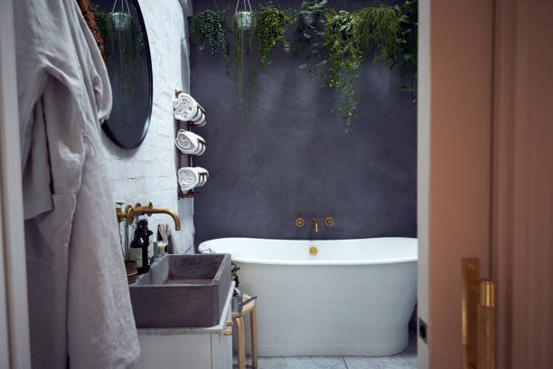 istock Empty Interior Of Contemporary Bathroom With Free Standing Bath Viewed Through Doorway 1178294452