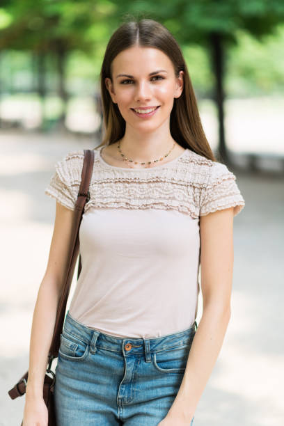 istock Woman walking in a park 1178301401