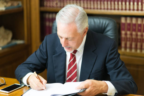 istock Businessman writing in office 1178302305
