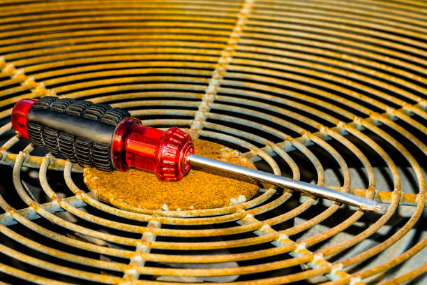istock top view rusty screwdriver kept on the rusty fan grill 1178302392