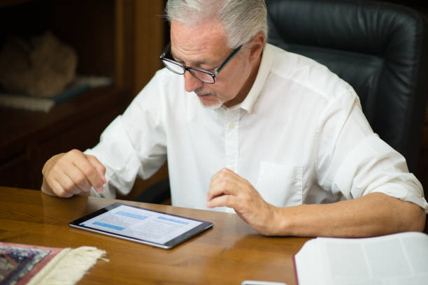 istock Businessman at work in his office 1178302975