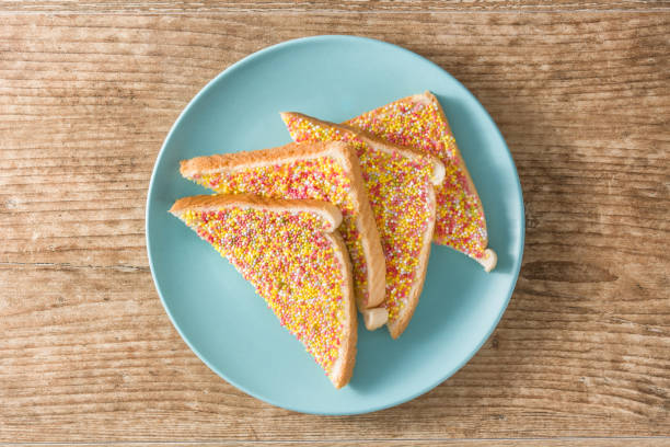 Traditional Australian fairy bread on wooden table