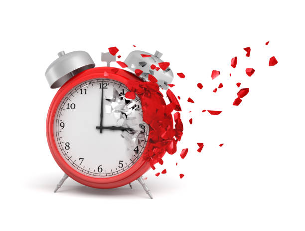 istock 3d rendering of red alarm clock shattering into small pieces isolated on white background 1178303426