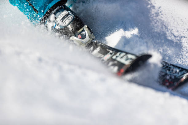 Close up of skiing on snow.