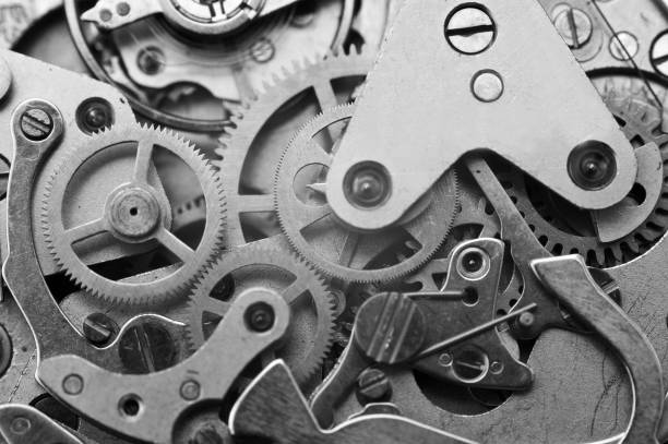 istock Clockwork, black-and-white gears in an watch. Teamwork concept, idea, technology, eternity, business. Macro. Design minimalism, Retro style 1178309858