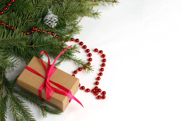 istock Christmas composition with a branch. Christmas tree and gift 1178312624