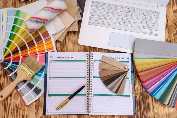 istock Top view at diary with laptop and color swatch 1178314476