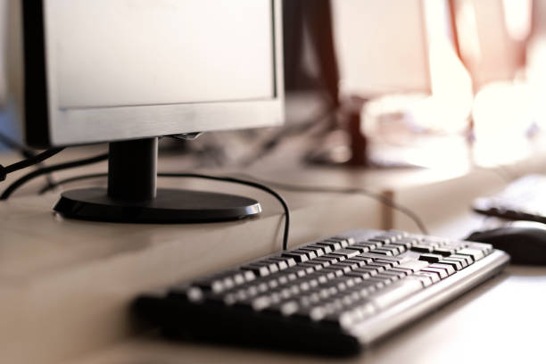istock Desktop PC  and other equipment in Office Interior 1178315459