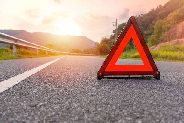 istock Red triangle, red emergency stop sign, red emergency symbol on road. 1178316242