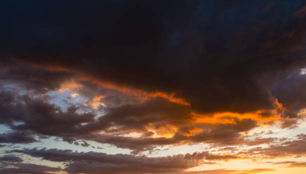 istock Storm clouds at sunset in bright colors 1178317860