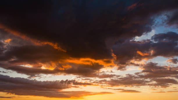 istock Storm clouds at sunset in bright colors 1178317916