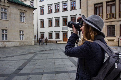 Unrecognizable Tourist Woman with Camera Exploring Bratislava, Slovakia