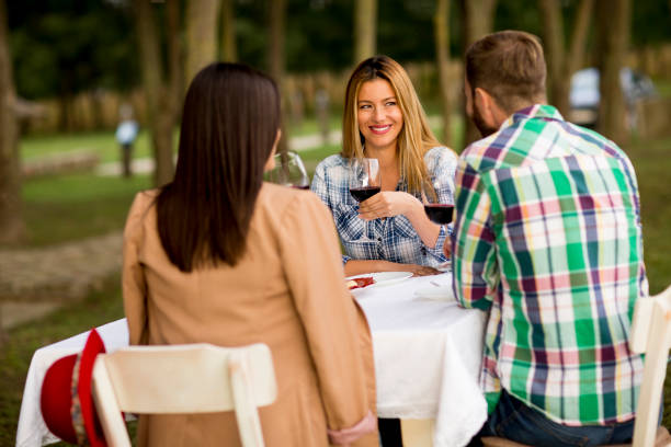 istock Young people by the table in the vineyard 1178321591