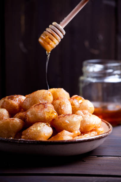 Loukoumades Greek Honey Donuts stock photo