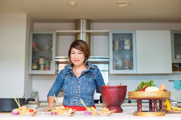 istock Chef demonstrating the meal she has prepared 1178323672