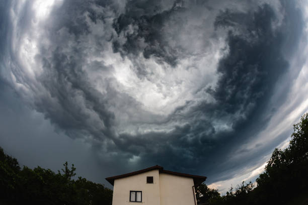 House With Storm Clouds Above stock photo