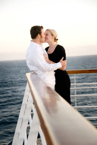 istock Couple kissing on cruise ship 117832734
