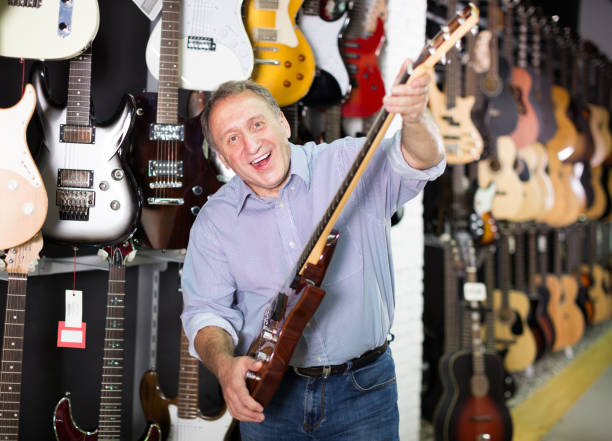 istock musician demonstrating an electric guitar 1178327347