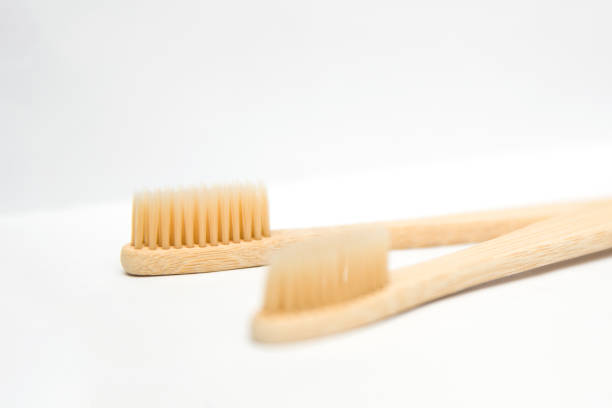 istock Bamboo toothbrushes isolated on the white background 1178327602