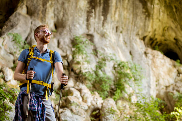 istock Caucasian male hiker with backpack hiking on sunny day 1178328742