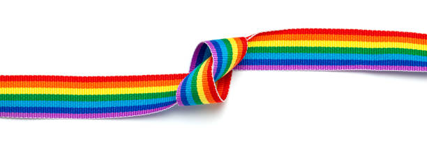 istock Tape with a knot. LGBT pride rainbow ribbon isolated on a white background 1178329268