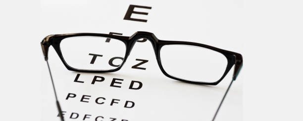 istock Eye test with glasses and letters 1178330529