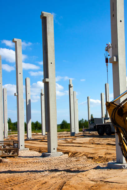 istock Construction site with blue sky piers and concrete mixer 1178330837