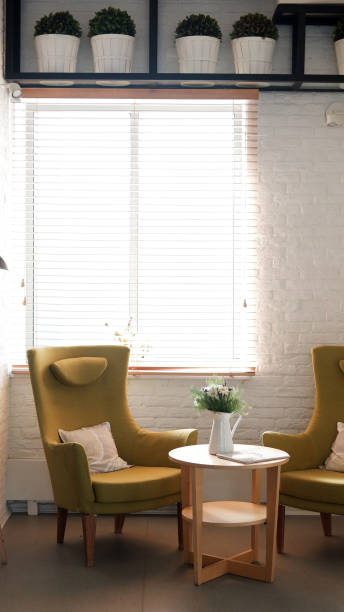 istock yellow armchair and white table. interior 1178331936