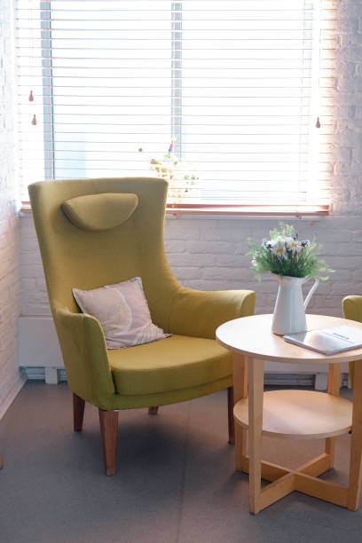 istock yellow armchair and white table. interior 1178332510