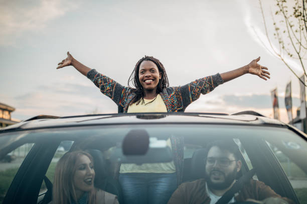 istock Black lady enjoying in car ride 1178333194