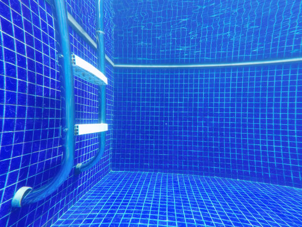 istock Swimming pool tiles underwater 1178333626