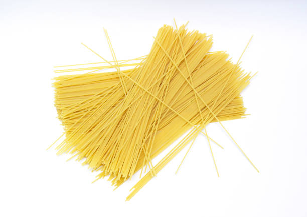 fresh spaghetti isolated over white background. cooked, fresh spaghetti - spaghetti cooked heap studio shot imagens e fotografias de stock