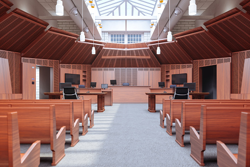 Interior of an empty modern large courtroom.