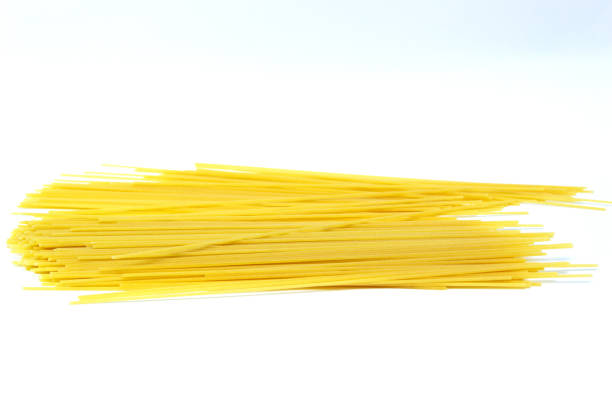 fresh spaghetti isolated over white background. cooked, fresh spaghetti - spaghetti cooked heap studio shot imagens e fotografias de stock