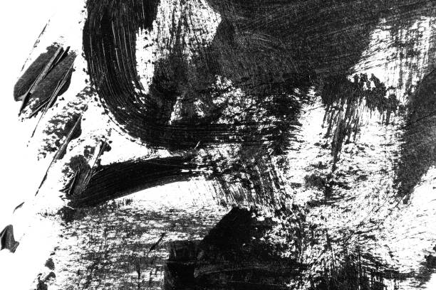 istock Closeup black acrylic brush strokes, scribble and stain on white paper. Abstract grunge handmade drawing. 1178336854