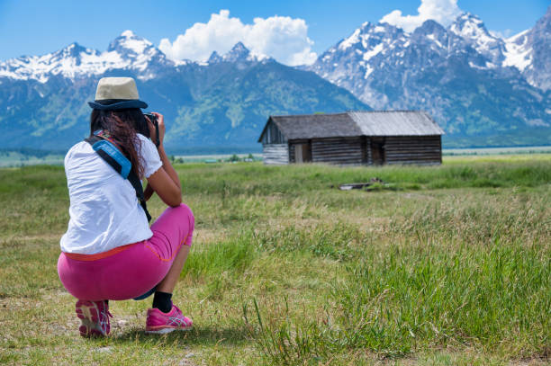 A photo shoot at an old village. Grand Teton National Park. Wyoming A photo shoot  at an old village. Grand Teton National Park. Wyoming mormon woman photos stock pictures, royalty-free photos & images