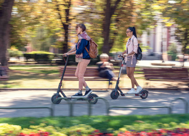 istock Friends going out in the city with e-scooters 1178338207