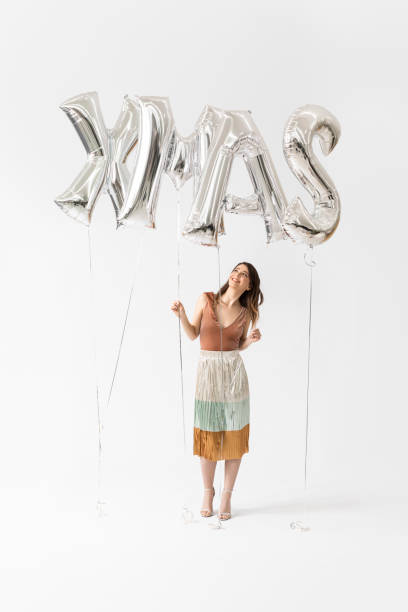 istock Beautiful Woman Celebrating Christmas 1178342055