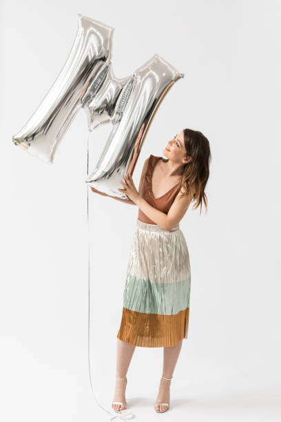 Stylish Woman Holding Helium Balloon