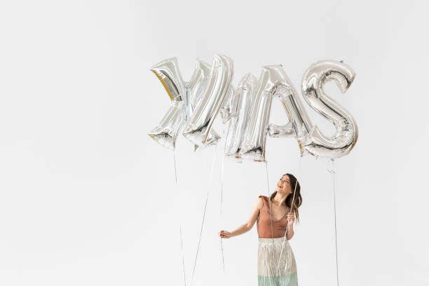 istock Beautiful Woman Celebrating Christmas 1178342089