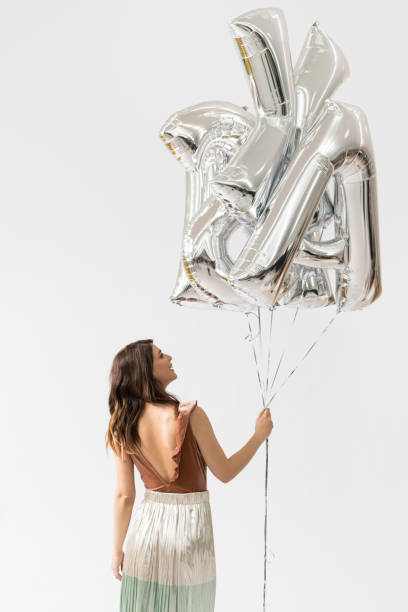 istock Beautiful Woman Celebrating Christmas 1178342110