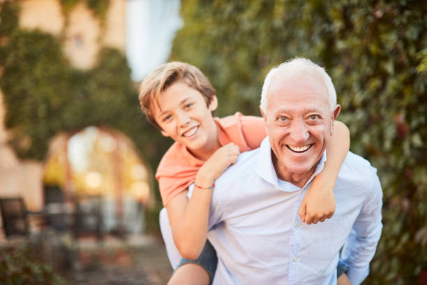 istock Grandson piggyback with his grandfather. 1178343702