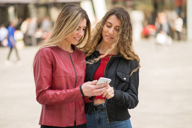 istock Smiling friends taking a photo together 1178345065