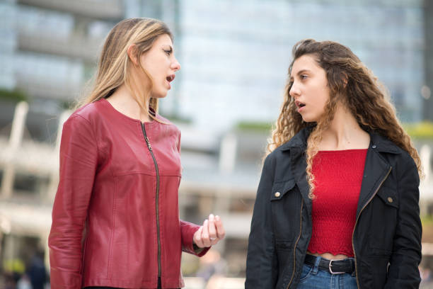 istock Female friends talking outdoors 1178345152