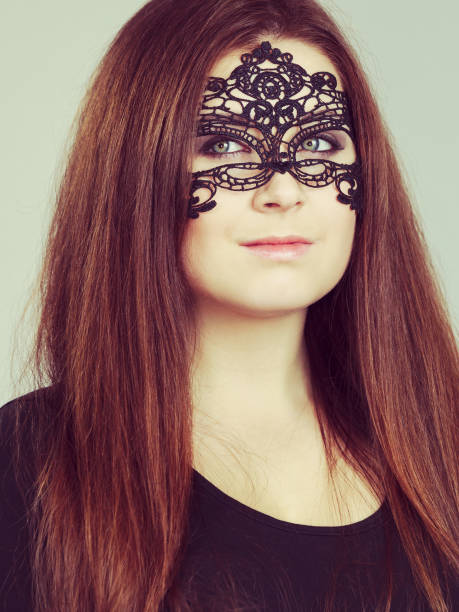 istock Mysterious woman wearing lace mask 1178345352