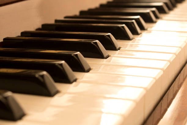 istock Piano keys. Piano keys background. Selective focus. 1178345551