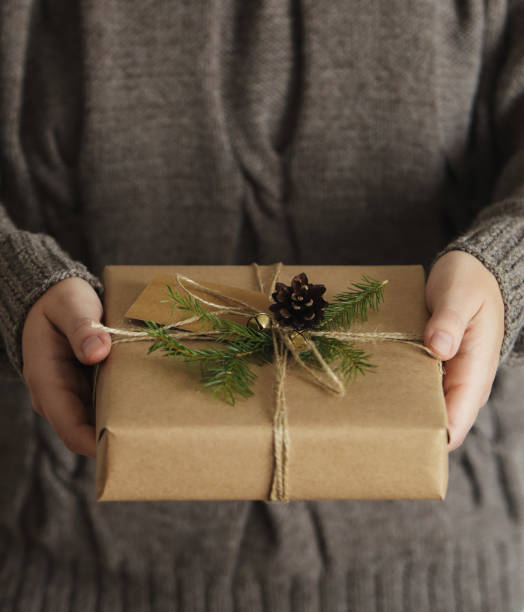 Woman holding Christmas present