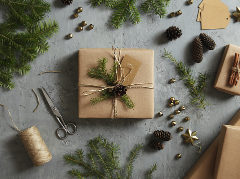 High angle view of Christmas presents wrapped in kraft paper